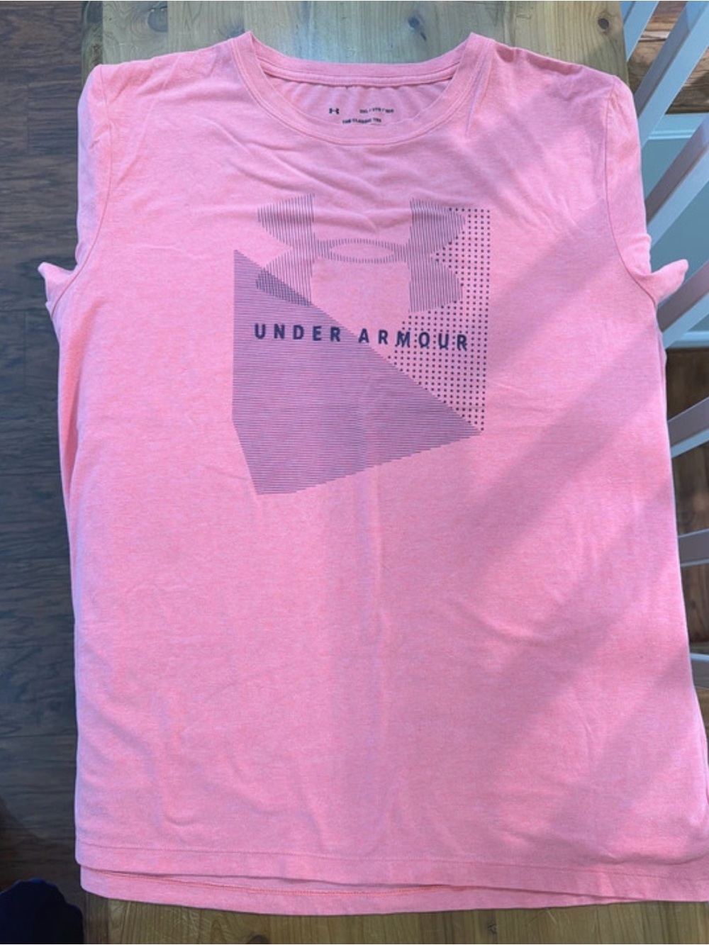 Under Armour women's pinkish/melon colored Graphic Performance Tee